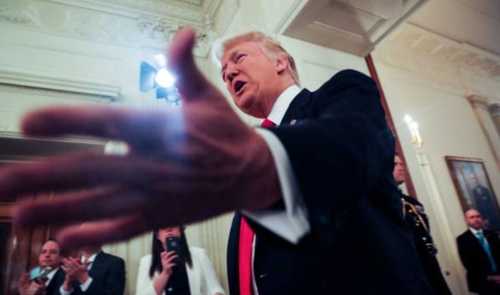 Unidentified-red-marks-on-trumps-hand-raise-speculation